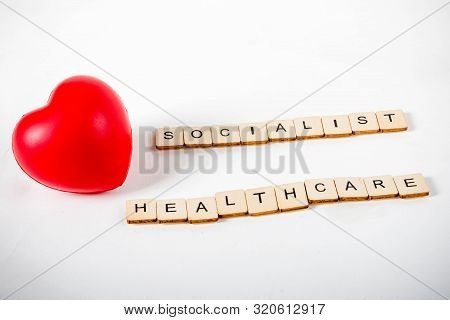 Healthcare Concept Showing A Heart And The Message Socialist Healthcare