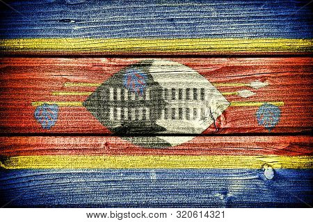 Flag Of Swaziland Painted On Old Grungy Wooden  Background