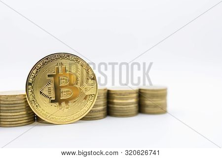 E-commerce, Crypto Currency And Money Concept.  Close Up Of Bitcoin Coin With Row Of Stack Of Gold C