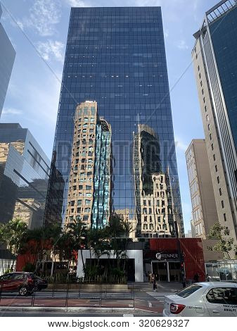 Sao Paulo, Brazil - June 11, 2019: Banks, Offices And Shops On The Main Street Avenida Paulista In S