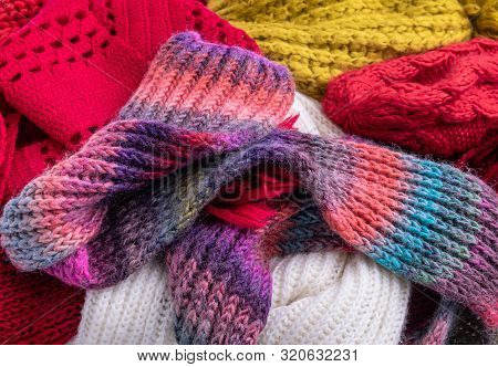 Winter Multi-colored Woolen Shaf As A Background.