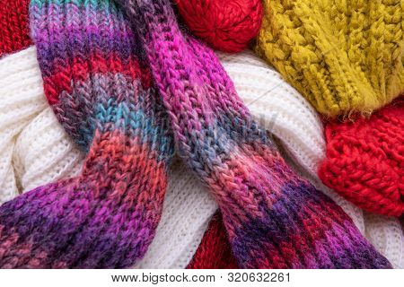Winter Multi-colored Woolen Shaf As A Background.