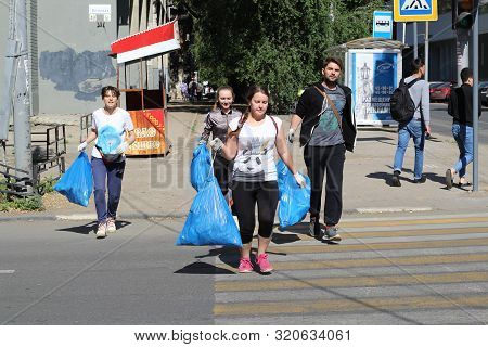 Plogging. Young People Are Happy That They Managed To Collect City Garbage. Saratov, Russia, 10 June