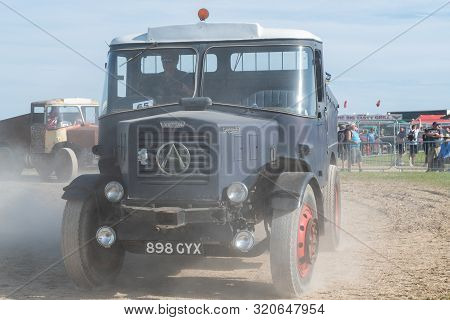 Blandford Forum.dorset.united Kingdom.august 24th 2019.a Restored Vintage Lorry Is Being Driven At T