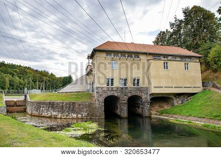 Rutki, Pomorskie / Poland - September, 5, 2019: Hydroelectric Power Plant On The Radunia River. A Bu