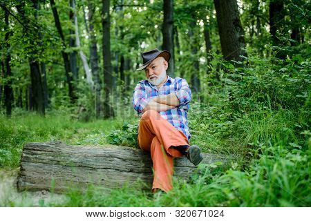 Freak Healer. Folk Magic. Mature Man With Beard In Hat. Wise Old Man. Herbal Remedies. Supernatural 