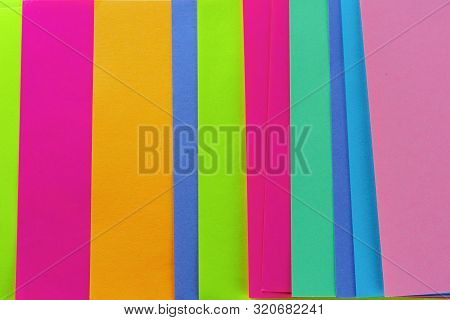 Blue, Pink, Yellow, Purple, Green, Orange Neon Paper Color For Background. Striped Geometric Pattern