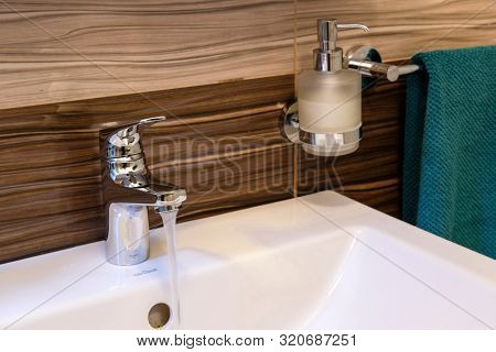 Moscow region, Russia - August, 23, 2019: The image of a water tap in a hotel bathroom in Mosocw region, Russia