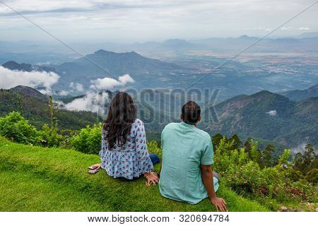 Couple Isolated Soaking Up Natural Beauty From Hill Top Image Is Showing The Human Love Towards The 