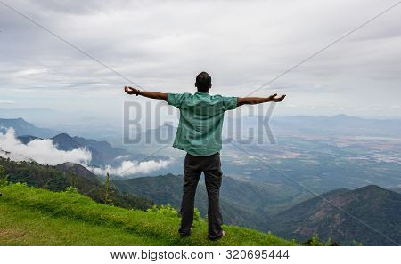 Man Isolated Soaking Natural Beauty From Hill Top Image Is Showing The Human Love Towards The Nature