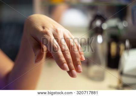 Beautiful Female Hand With Fresh Manicure After Massage.