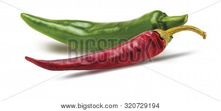 Fresh Green Chilli Pepper And Dry Red Chilli Pepper. Isolated On White Background.