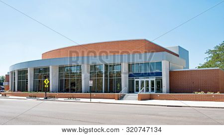 Contemporary Red Brick & Glass Concave Building