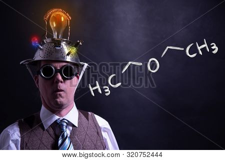 Nerd Presenting Handdrawn Chemical Formula Of Diethylether