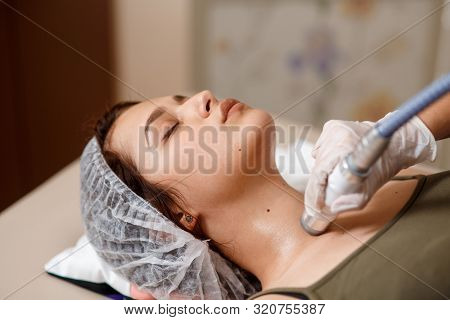 Lymphatic Drainage Massage Lpg Apparatus Process. Therapist Beautician Makes A Rejuvenating Facial M