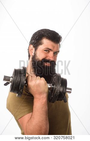 Healthy Sports Lifestyle, Fitness Concept. Handsome Man Lifting Dumbbell At Gym. Athletic Young Male
