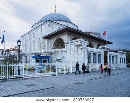 Istanbul, Turkey - October 10, 2018: People Walking Past Sultanahmet Medresesi, The Historic Site In