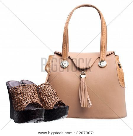 Pair of women open-toe clogs and handbag