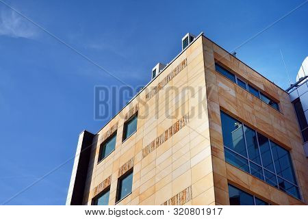 The Windows Of A Modern Building For Offices. Business Buildings Architecture.