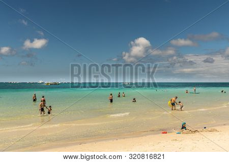 Balabag, Boracay Island, Philippines - March 4, 2019: White Beach Shows Sand And Azure Sea With Plen