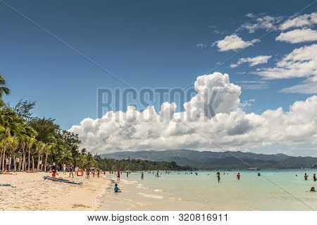 Balabag, Boracay Island, Philippines - March 4, 2019: White Beach Shows Sand And Azure Sea With Wall