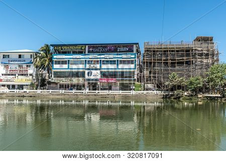 Balabag, Boracay Island, Philippines - March 4, 2019: Multiple Businesses In Four Story Buildings Un