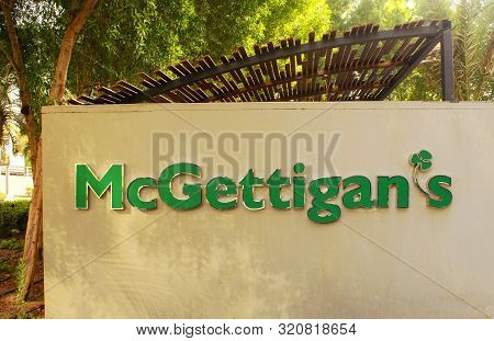 Dubai / Uae - September 5, 2019: Logo Sign Of Mcgettigans Irish Pub On Outdoor Wall In Jlt.
