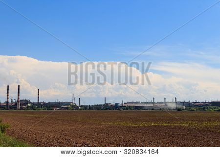 Industrial Landscape. View Of Factory In Nikopol, Dnepropetrovsk Region. Nikopol Ferroalloy Plant Is
