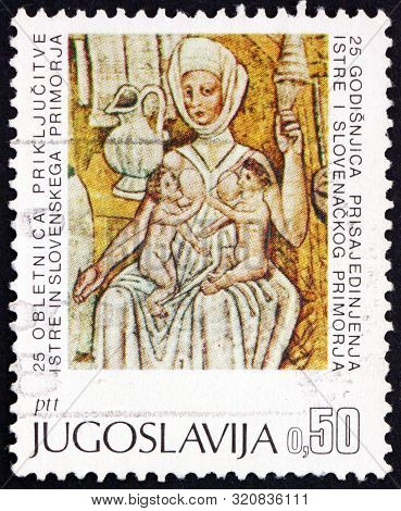 Yugoslavia - Circa 1968: A Stamp Printed In Yugoslavia Shows Mother Nursing Twins, Fresco By Jan Of 