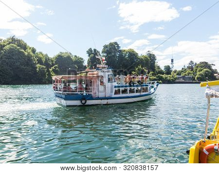Valdivia, Chile - January 12, 2018: A Ferry Boat With Tourists Sails Along The Valdivia River, In Th