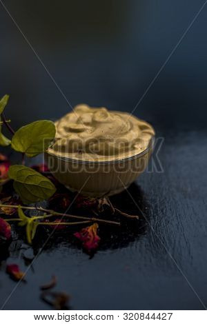 Homemade Diy Face Mask On The Wooden Surface Consisting Of Yogurt,multani Mitti Or Mulpani Mitti (fu