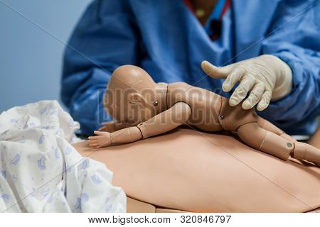 Details With Plastic Dummies Representing A Woman And Her Newly Born Baby Used By Medics And Midwive