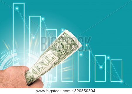 Declining Steps Of American Dollar Banknote With A White Man Hand Holding One Dollar Bill In The Fro