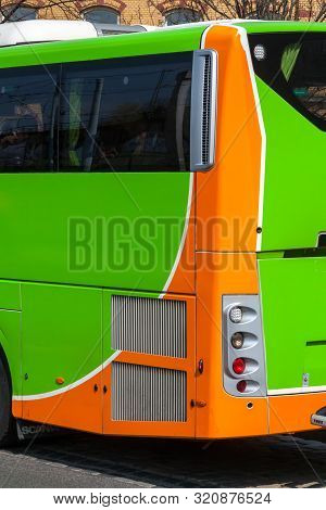 A Green Flixbus Seen From The Rear