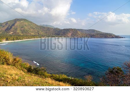 Beautiful landscape of Senggigi beach, Lombok island, scenic travel destination beach with crystal blue waters, Indonesia 
