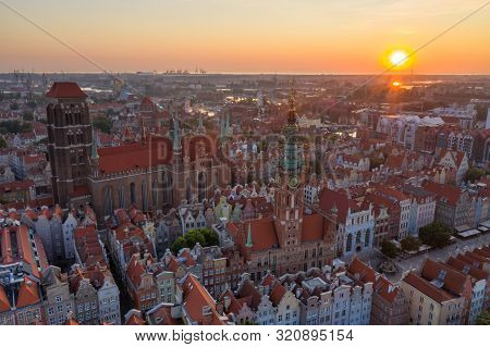 Gdansk Is A City In Poland. Gdansk In The Morning Rays, The Sun Is Reflected From The Roofs Of The O