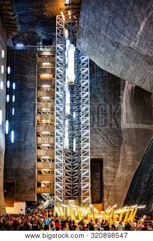 TURDA, ROMANIA - AUG 15, 2019: Turda Salt Mine or Salina Turda, well known landmark in Transylvania with an underground museum and theme park, Romania, Europe