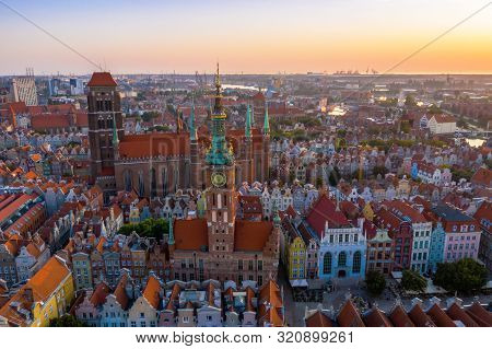 Gdansk Is A City In Poland. Gdansk In The Morning Rays, The Sun Is Reflected From The Roofs Of The O