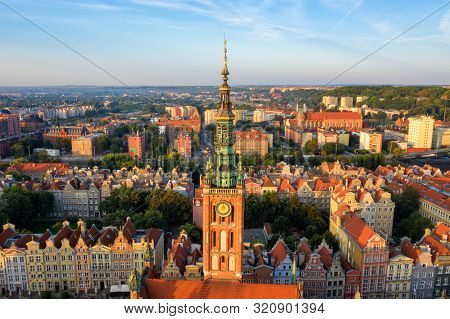Gdansk Is A City In Poland. Gdansk In The Morning Rays, The Sun Is Reflected From The Roofs Of The O