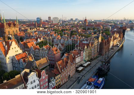 Gdansk Is A City In Poland. Gdansk In The Morning Rays, The Sun Is Reflected From The Roofs Of The O