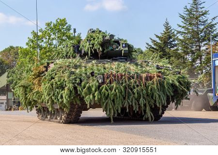 German Army Infantry Fighting Vehicle  Drives On Tactical Exercise At Military Training Area