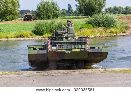 Minden / Germany - September 4, 2019: German Tank Pioneer Battalion Trained A Tank Crossing Over A R