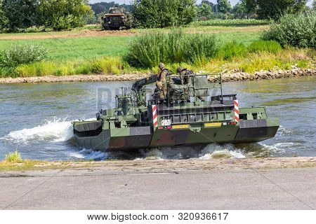 Minden / Germany - September 4, 2019: German Tank Pioneer Battalion Trained A Tank Crossing Over A R