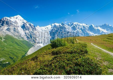 Svaneti Landscape With Glacier And Snow-capped Mountain In The Back Near Mestia Village In Svaneti R