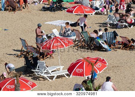 Clacton   United Kingdom 23 August  2019  -:  Holidaymakers On Clacton Beach