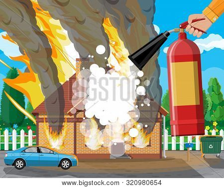 Wooden House Burns Fire In Cottage. Extinguish Fire In Home. Fireman Hand With Fire Extinguisher. Pr