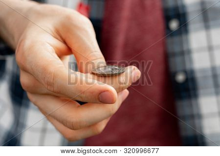 Close Up Shot Of Hand Toss A Coin, Probable And Winning Chances Concept, Fifty-fifty S