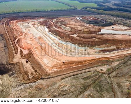 Opencast mining quarry . Industrial Extraction of lime, chalk, sand, calx, caol. top Aerial view