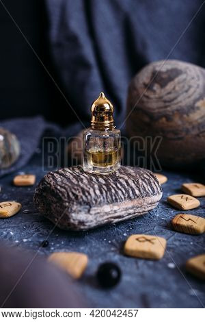 Small Glass Bottle With Natural Magic Oil. Cosmetic And Magic Elixir.