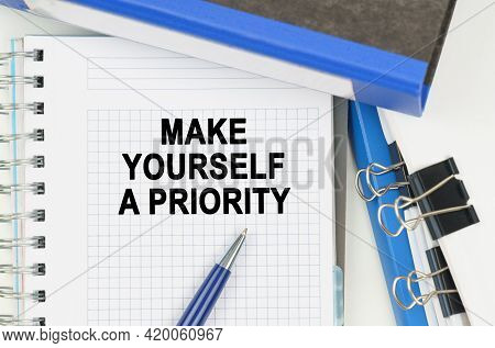 Business And Economics. Among The Documents, Folders, A Notebook With The Inscription - Make Yoursel